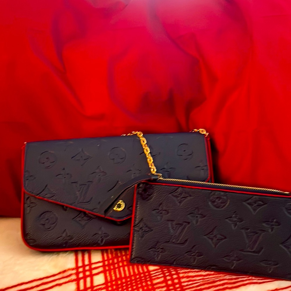 Small, clutch. Gold chain for crossbody. Cardholder and Amal pouch included.
